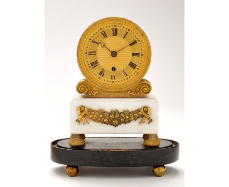 Yonge & Son, Strand, London: a Regency giltmetal and marble mantel timepiece, the gilt cylindrical body with brass roman dial