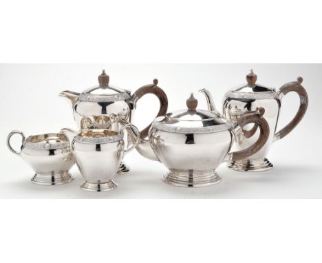 An Elizabeth II five-piece tea and coffee service, by Reid & Sons Ltd., London 1975 (4) 1978 (1), Lindisfarne pattern, height