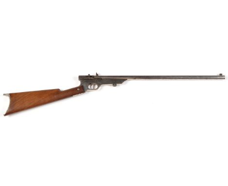 A Quackenbush .22 cal. rifle, the 22in. heavy plated barrel with hinged breech holding the firing pin, solid mounts below wit