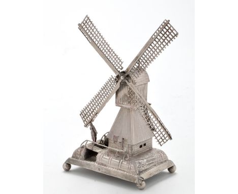 A Dutch silver model of a windmill, bears import marks for Boaz Moses Landeck, Chester 1912, 5 3/4in. (14.5cms) high, 3.2oz.