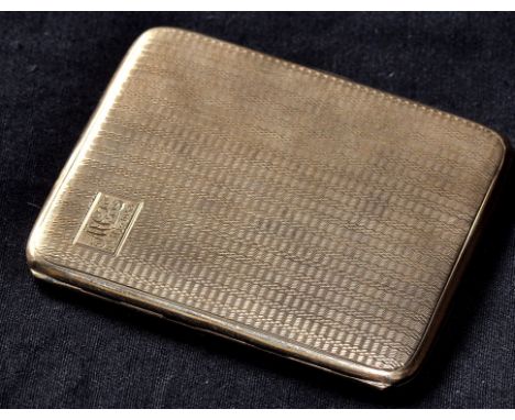 A George V 9ct. gold engine turned cigarette case, engraved initials and dated, 71.3grms, cased.