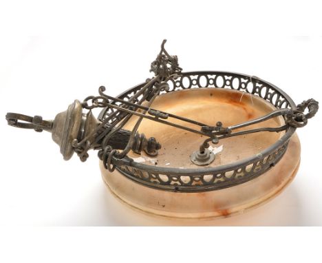 An early 20th Century hanging ceiling light fitting, the lacquered brass mount with floral decoration and pierced ring holdin