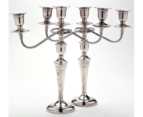 A pair of modern three-light twin-branch candelabra, 14 1/4in. (36cms).