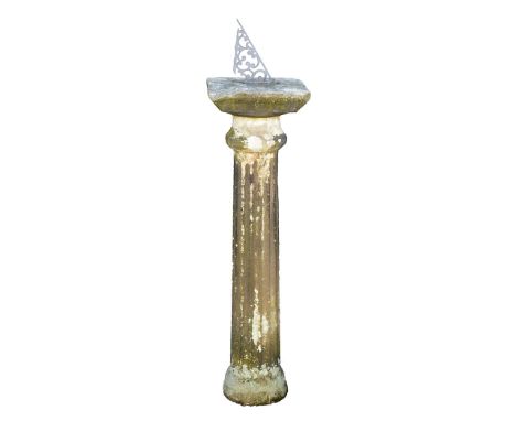 A cast metal sundial on stone stand, the sundial inscribed "Ray Brown '83, on a square plinth fluted tapering stem with mould