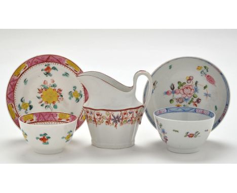 Two 'New Hall' tea bowls and saucers, pattern no's. 593 and 947, saucers diameter 13cms approximately; and a cream jug, patte