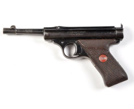 A Tell model 3 .177cal. air pistol, no. 215 circa 1937, fitted break barrel action to patinated steel body, wood effect plast