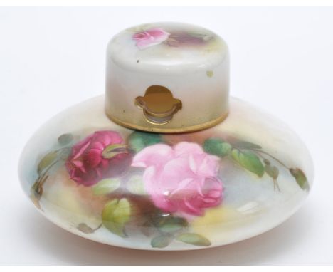 Royal Worcester potpourri vase and cover, the compressed bulbous body painted with pink roses beneath pierced quatrefoil neck