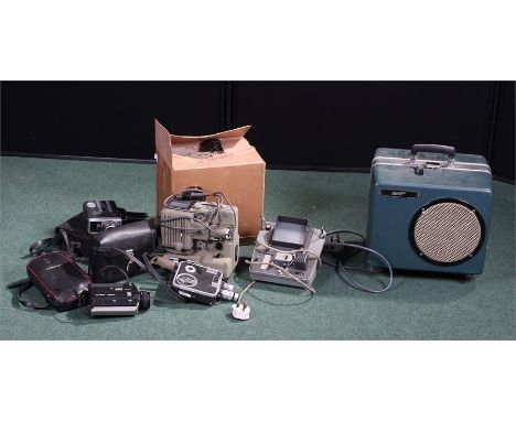 A collection of 8mm cine equipment, including a Kodak a camera, Elf and eumig projectors, and an editing suite, (Qty)