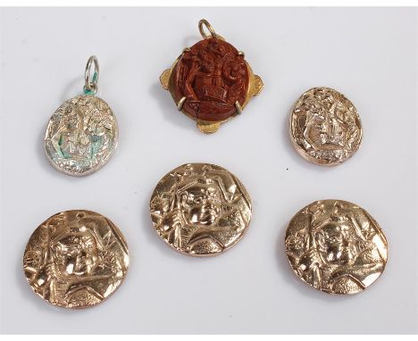 Oriental jewellery, to include a carved nut section on yellow metal back, a pair of silver Chinese pendants and a set of thre