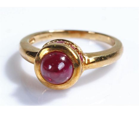 9 carat gold and ruby ring, the cabochon ruby with ruby edges, ring size N 