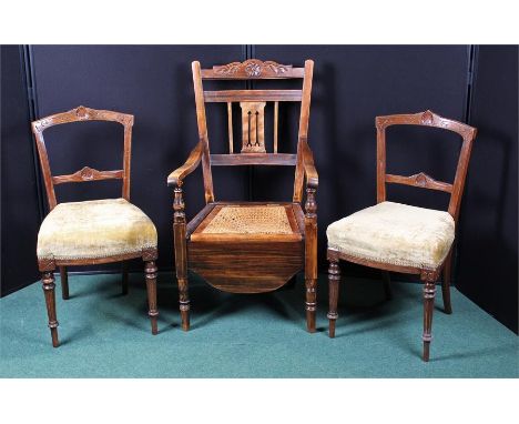 Pair of Edwardian chairs, with stuff over seats, together with a caned commode armchair, (3)