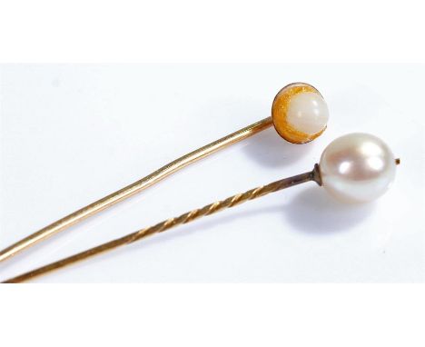 Two pearl stick pins, on yellow metal pins, cased within a S.Mitani Yokohama box, (3)