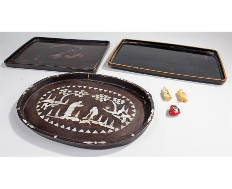 Oriental items to include a black lacquered tray, a black lacquered tray with painted dragon motif, a black lacquered tray wi