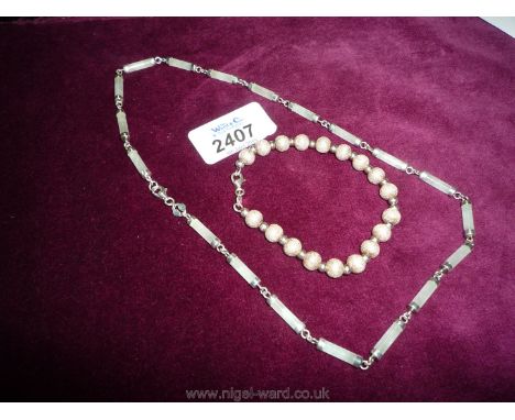A 925 Jade necklace and a 925 Milan, Italy bracelet