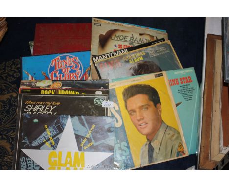 A quantity of L.P.'s to include Elvis, Moe Bandy, Top of the Pops, etc.,