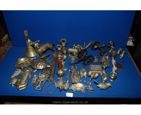 A good quantity of brass including bell, spring balance scales, animals, wall bell, door knocker, trench art etc