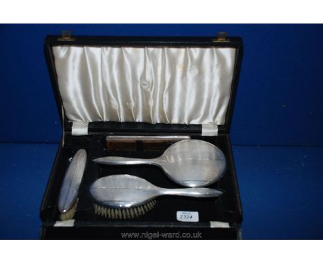 A boxed Silver engine turned Dressing Table set