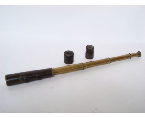 An early 20th Century leather bound brass four drawer military issue telescope marked F. Robson & Co Newcastle - on - Tyne, b