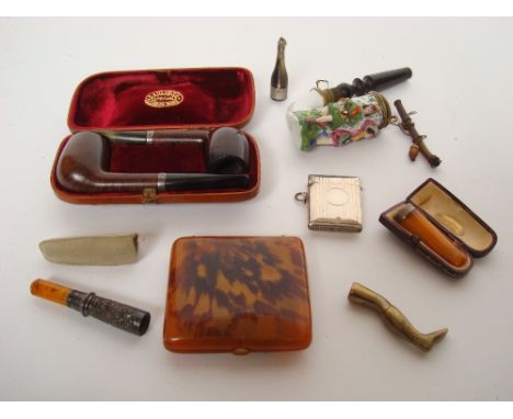 A George V silver vesta case, Birmingham, 1911, by Samuel M. Levi, engine turned decoration, a pair of Barling's pipes with s