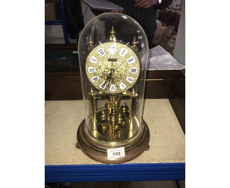 CLOCK WITH PLASTIC DOME ( SOLD AS SEEN )