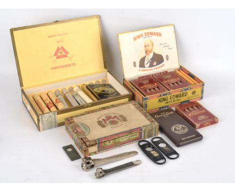A collection of cigars and related items including ; four Montecristo Cuban cigars, a Romeo No2 Cuban cigar, two H Upmann Cub