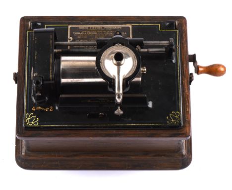A vintage Edison Fireside Phonograph, serial number 21271, wooden cased with original ebonised horn and an associated green m