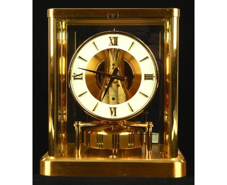 A Jaeger Le Coultre Atmos Clock, 540 calibre, number 632576, brushed brass case, height 22.5cm, width 19.5cm depth 15.5cm.Con