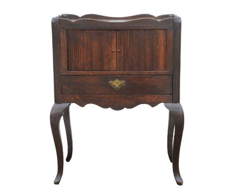 A George III oak tray top bedside commode, with tambour doors, side pierced handles and drawer, H 70cm, W 56cmCondition Repor