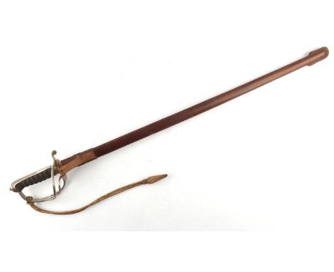 An 1821 Pattern Artillery officers sword by Wilkinson Sword Co Ltd London. The slightly curved engraved blade (86cm) detailed