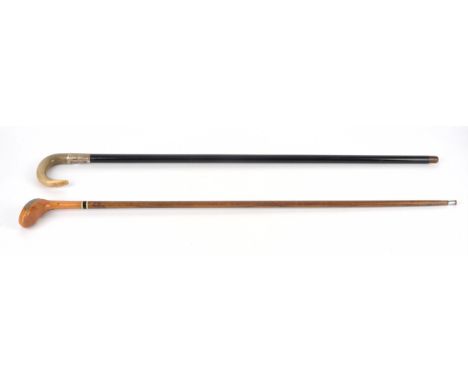 A late 19th century novelty walking stick with silver mounted horn handle, the ebonised shaft enclosing a long brass thermome
