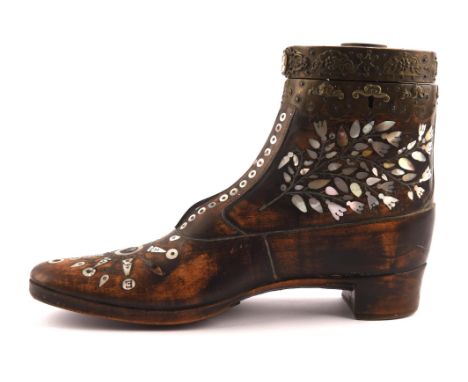 A large Victorian treen mother of pearl and steel inlaid snuff boot, the hinged lid with embossed brass detailing, the toe wi