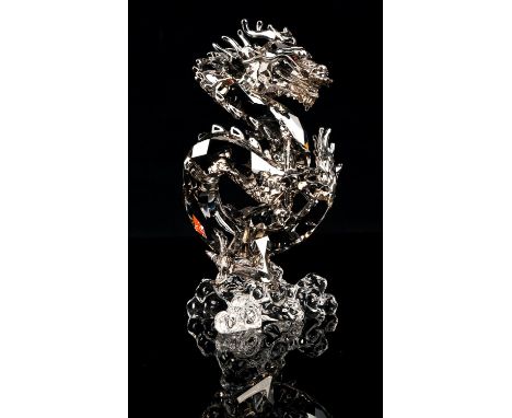 Swarovski crystal; Smoky grey glass sculpture of a coiling dragon (Jubilee Dragon), celebrating the year of the Dragon and 25