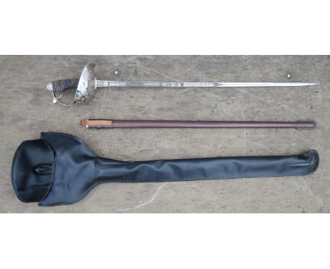 An Elizabeth ll Cavalry officers dress sword by Wilkinson Sword Ltd, with slightly curved engraved steel blade (89cm), silver