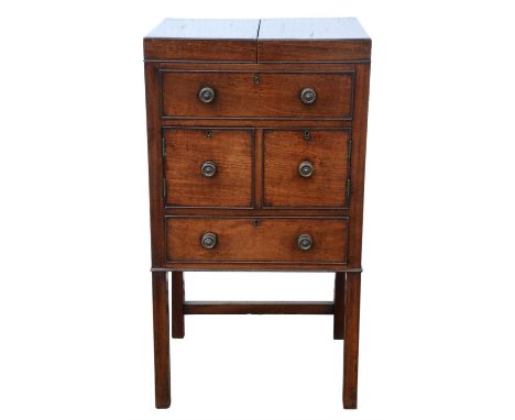 George III mahogany gentlemans dressing commode, with lifting lids to reveal apertures for a bowl and other items, all vacant