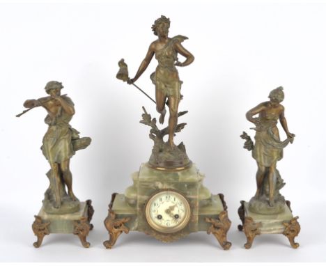French spelter and green onyx clock garniture, late 19th/early 20th Century, the clock mounted with a female figure of a lady