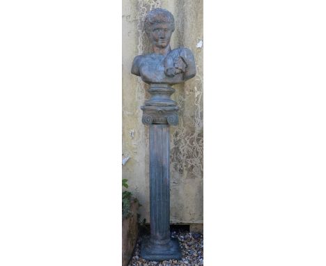 Patinated reconstituted stone sculpture of a Classical man, possibly Artemis,  20th Century, the bust 60cm high, the column 9