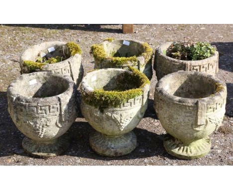 Six reconstituted stone planters, each with moulded Greek key bands to rims and ring handles, with  grapes to the body, 26cm 