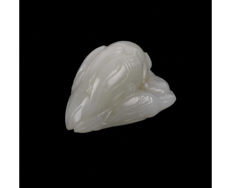A small green Chinese jade, carved as a bird-of-prey attacking a duck, about 5 cm long
