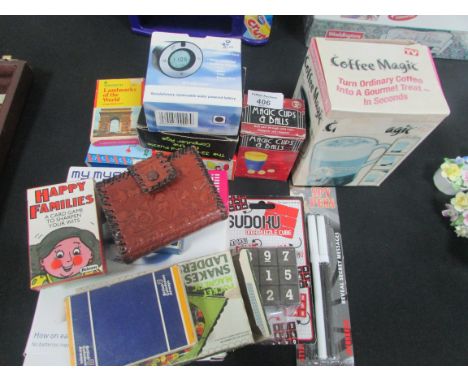 Small quantity of miscellaneous items including magic coffee mug / spy pens etc.