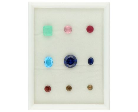 No Reserve - Lot of nine different gemstones Including topaz, tourmaline, emerald, doublet ruby, synthetic spinel. 6 x round,