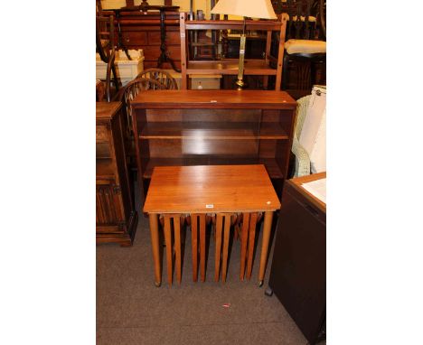 Teak nest of four drop leaf tables, teak sliding glazed door bookcase, brass finish standard lamp and shade, teak two tier di