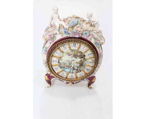 Continental porcelain mantel clock, 39cm high.