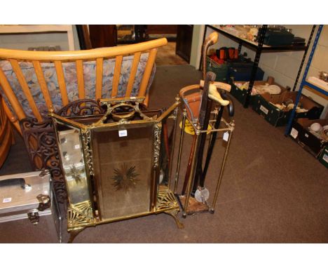 Edwardian brass and mirror panelled fire screen, wrought iron fire screen, chrystoleum, brass stick stand and sticks.