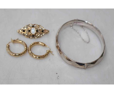 9 carat gold, opal and sapphire ladies bar brooch, 14 carat gold creole earrings and a silver bangle.