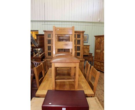 Rustic style light oak eight piece dining suite comprising glazed panel door top dresser, extending dining table with integra