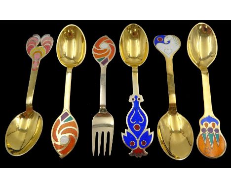 Collection of six Danish silver-gilt year spoons/forks by Anton Michelsen, each with abstract enamel decoration, including tr