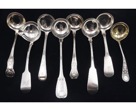 Collection of eight 19th century silver ladles/sifting spoons, to include Victorian Irish silver Fiddle pattern sauce ladle, 