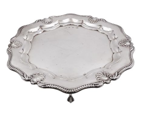 Modern silver waiter, of hexagonal form, with gadrooned and palmette detailed rim, upon three ball and claw feet, hallmarked 