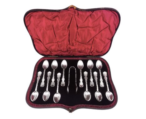 Set of ten Victorian silver coffee spoons, each with shaped scroll design rim, and a matching pair of sugar tongs, hallmarked