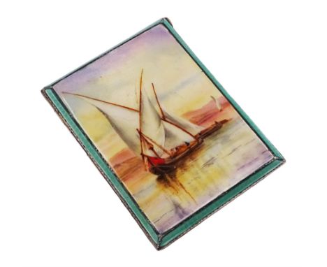 Art Deco silver and enamel cigarette case, depicting a sailing boat scene upon an engine turned opalescent ground, with green